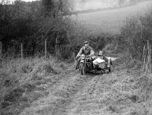 Sunbeam and sidecar competing in the Inter-Varsity Trial, November 1931. Artist: Bill Brunell.