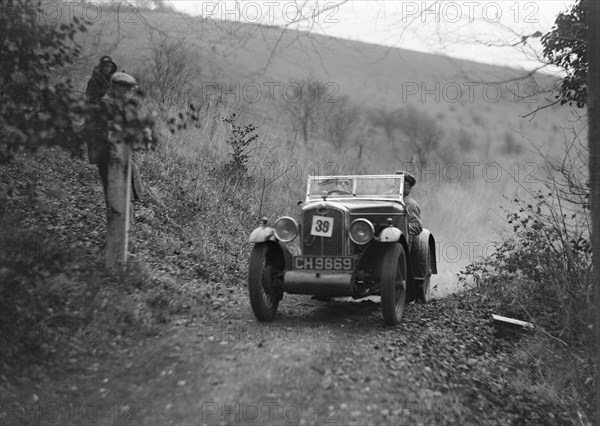 Wolseley Hornet of JM Suggs competing in the Inter-Varsity Trial, November 1931. Artist: Bill Brunell.