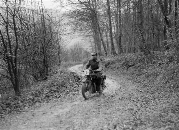 Motorcycle ridden by RD Quincy competing in the Inter-Varsity Trial, November 1931. Artist: Bill Brunell.