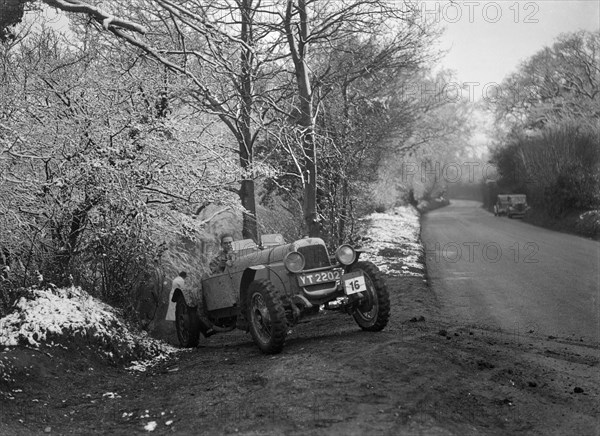 Alvis competing in a motoring trial, late 1930s. Artist: Bill Brunell.