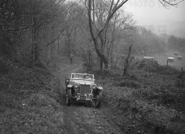 1936 MG TA taking part in a motoring trial, late 1930s. Artist: Bill Brunell.