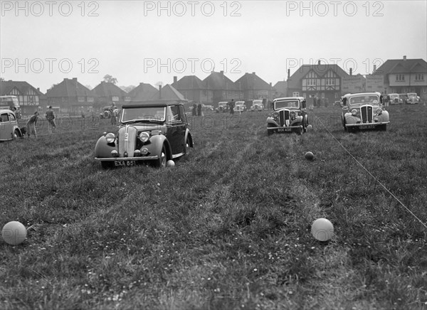 Two Standard Twelves and a Standard Nine at the Standard Car Owners Club Gymkhana, 8 May 1938. Artist: Bill Brunell.