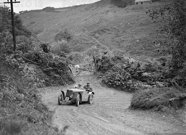 1933 MG J2 taking part in a motoring trial, late 1930s. Artist: Bill Brunell.