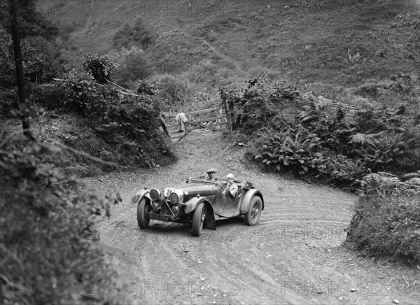 1935 Jaguar SS 90 2-seater taking part in a motoring trial, late 1930s. Artist: Bill Brunell.