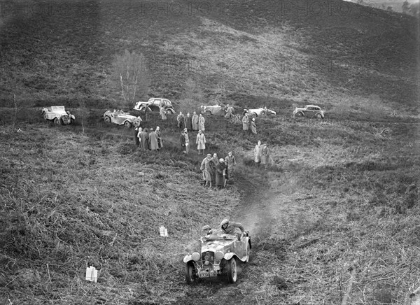 1933 Wolseley Hornet 2-seater sports taking part in a motoring trial, late 1930s. Artist: Bill Brunell.