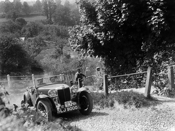 1934 MG Magnette taking part in a West Hants Light Car Club Trial, Ibberton Hill, Dorset, 1930s. Artist: Bill Brunell.