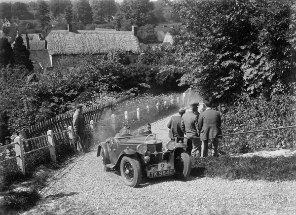 1933 MG J2 taking part in a West Hants Light Car Club Trial, Ibberton Hill, Dorset, 1930s. Artist: Bill Brunell.