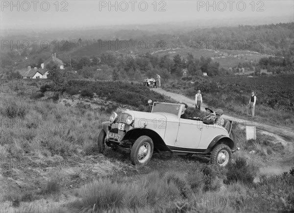 1933 Ford V8 taking part in the NWLMC Lawrence Cup Trial, 1937. Artist: Bill Brunell.