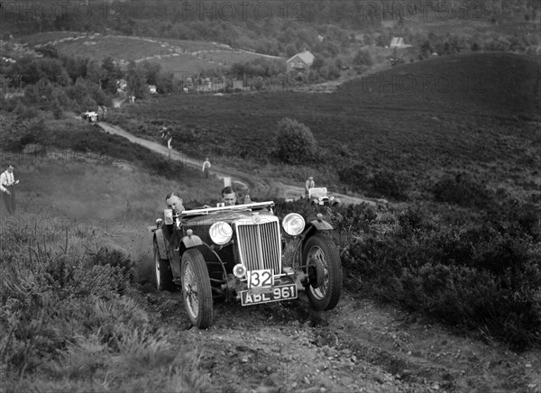 1936 MG TA of the Three Musketeers team taking part in the NWLMC Lawrence Cup Trial, 1937. Artist: Bill Brunell.