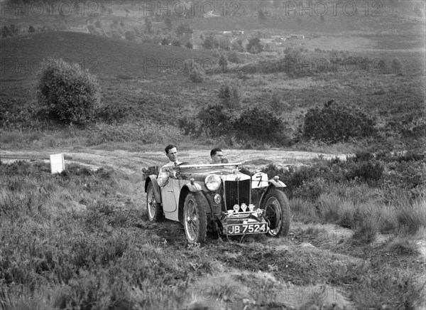 1935 MG PB of the Cream Cracker team taking part in the NWLMC Lawrence Cup Trial, 1937. Artist: Bill Brunell.