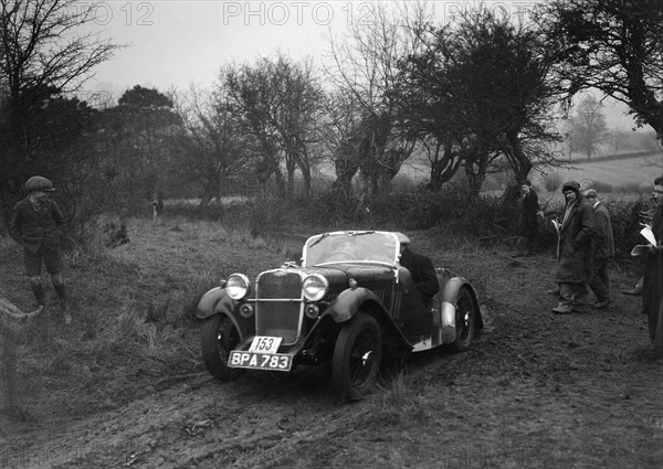 Singer of L Sandford at the Sunbac Colmore Trial, near Winchcombe, Gloucestershire, 1934. Artist: Bill Brunell.