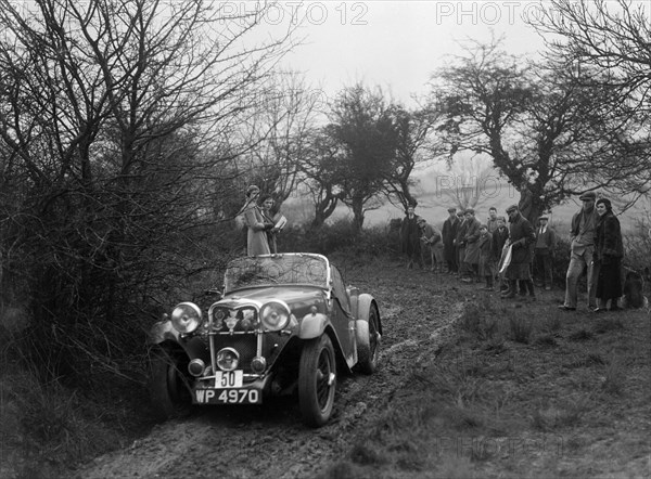 Singer Le Mans of AH Langley at the Sunbac Colmore Trial, near Winchcombe, Gloucestershire, 1934. Artist: Bill Brunell.