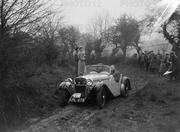 Singer open sports of WJD Richardson, Sunbac Colmore Trial, near Winchcombe, Gloucestershire, 1934. Artist: Bill Brunell.