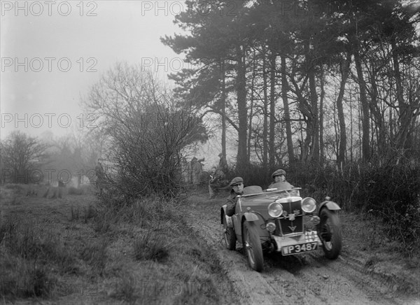 MG J2 of Bernard Bray at the Sunbac Colmore Trial, near Winchcombe, Gloucestershire, 1934. Artist: Bill Brunell.