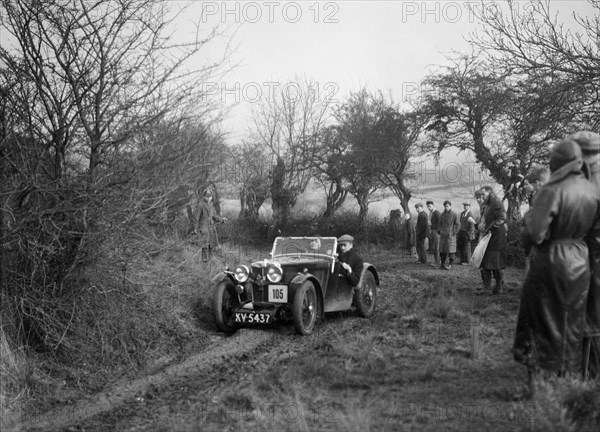 MG J2 of Mrs MM Riley at the Sunbac Colmore Trial, near Winchcombe, Gloucestershire, 1934. Artist: Bill Brunell.