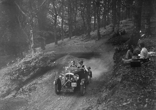 Wolseley Hornet of WAV Davis, B&HMC Brighton-Beer Trial, Fingle Bridge Hill, Devon, 1934. Artist: Bill Brunell.