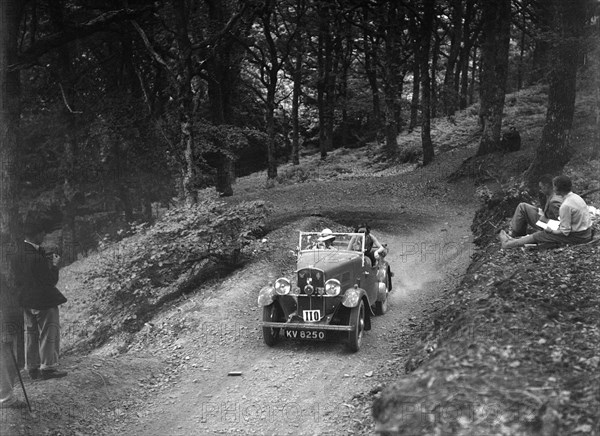 Triumph open tourer taking part in the B&HMC Brighton-Beer Trial, Fingle Bridge Hill, Devon, 1934. Artist: Bill Brunell.