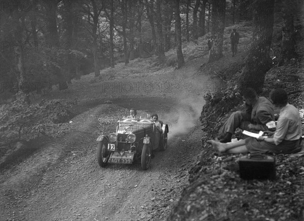 MG J2 of Doreen Evans taking part in the B&HMC Brighton-Beer Trial, Fingle Bridge Hill, Devon, 1934. Artist: Bill Brunell.