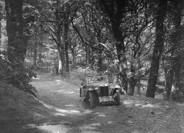 MG PA taking part in the B&HMC Brighton-Beer Trial, Fingle Bridge Hill, Devon, 1934. Artist: Bill Brunell.