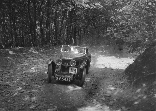 MG J2 competing in the Brighton & Hove Motor Club Brighton-Beer Trial, 1934. Artist: Bill Brunell.