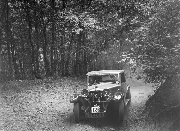 Riley competing in the B&HMC Brighton-Beer Trial, Fingle Bridge Hill, Devon, 1934. Artist: Bill Brunell.