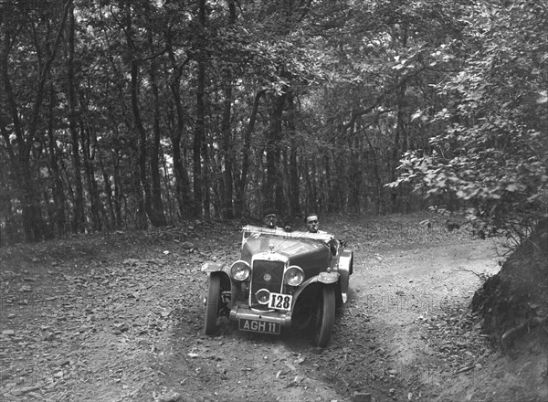 Hillman Aero Minx competing in the B&HMC Brighton-Beer Trial, Fingle Bridge Hill, Devon, 1934. Artist: Bill Brunell.