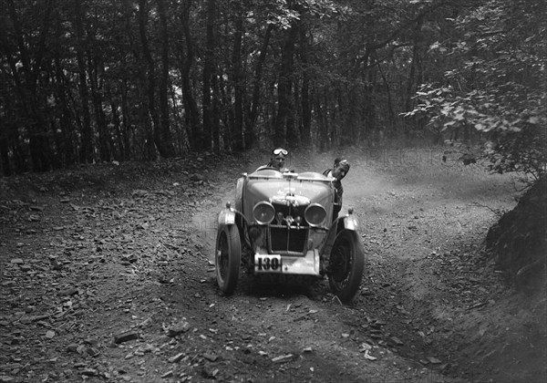 MG J2 competing in the B&HMC Brighton-Beer Trial, Fingle Bridge Hill, Devon, 1934. Artist: Bill Brunell.