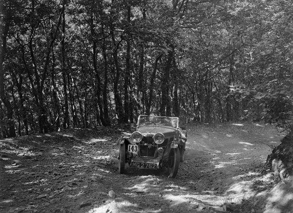 MG J2 competing in the B&HMC Brighton-Beer Trial, Fingle Bridge Hill, Devon, 1934. Artist: Bill Brunell.