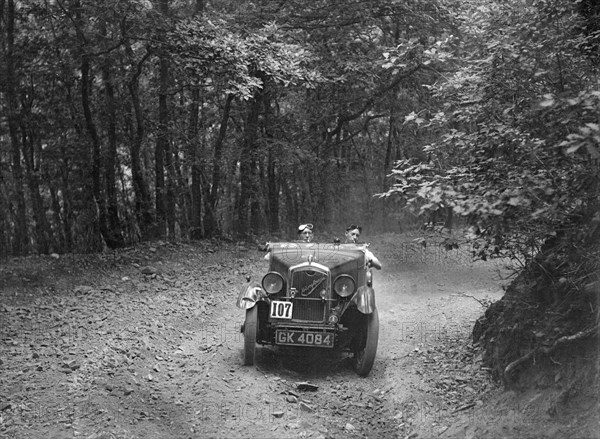 Wolseley Hornet McEvoy Special, B&HMC Brighton-Beer Trial, Fingle Bridge Hill, Devon, 1934. Artist: Bill Brunell.