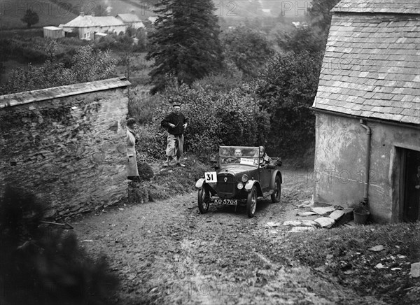 Austin Chummy of PW Sherrin competing in the JCC Lynton Trial, 1932. Artist: Bill Brunell.