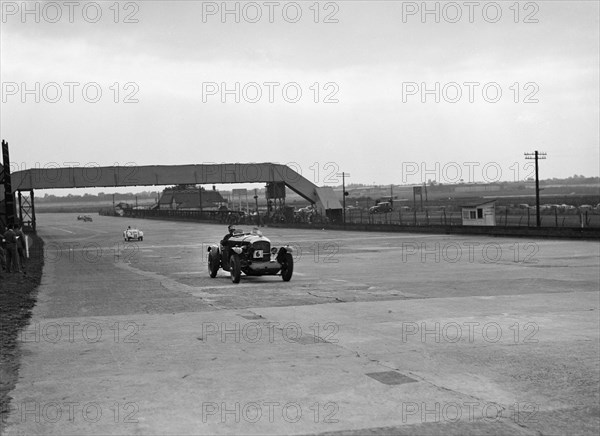 Bentley and Frazer-Nash BMW racing at Brooklands, 1938 or 1939. Artist: Bill Brunell.