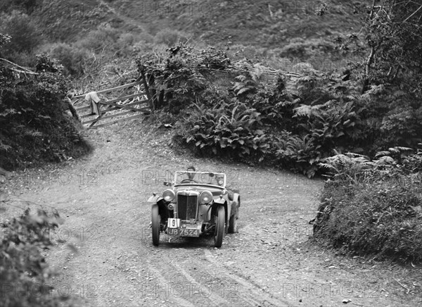 1935 MG PB of the Cream Cracker Team taking part in a motoring trial in Devon, late 1930s. Artist: Bill Brunell.