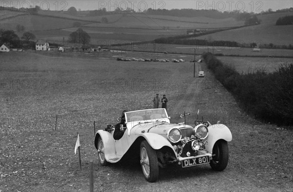 Jaguar SS100 at the Standard Car Owners Club Southern Counties Trial, 1938. Artist: Bill Brunell.