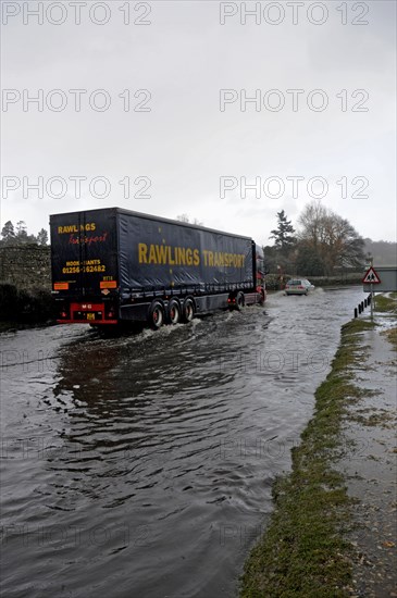 Vehicles on Flooded road at Beaulieu 2008. Artist: Unknown.