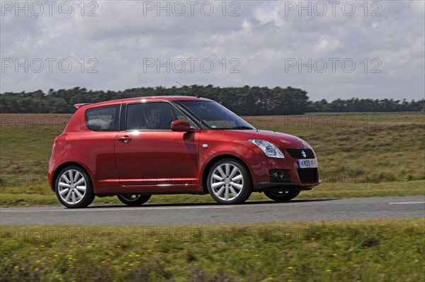 2009 Suzuki Swift Sport Artist: Unknown.