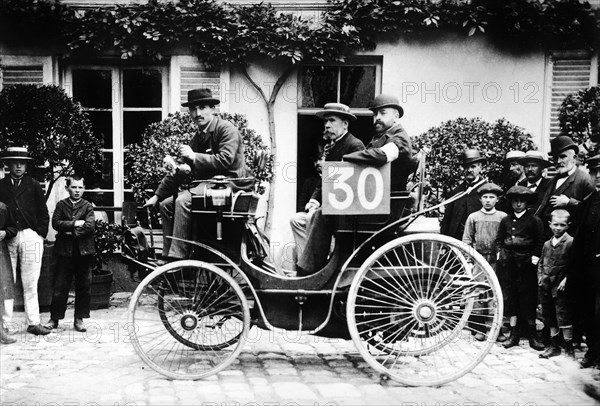 1894 Paris to Rouen race.Marchand in Peugeot Artist: Unknown.