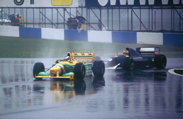 Benetton B193A Michael Schumacher and K.Wendlinger in Sauber Ilmor 1993 Euro GP at Donington Artist: Unknown.