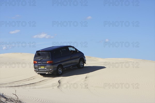 Mitsubishi Delica Space Gear V6 1996 in sand dunes New South Wales Australia Artist: Unknown.