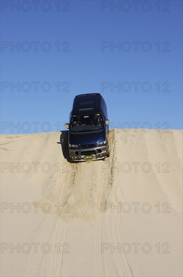 Mitsubishi Delica Space Gear V6 1996 in sand dunes New South Wales Australia Artist: Unknown.