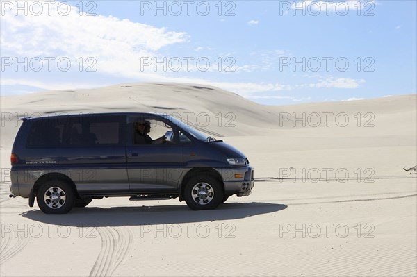 Mitsubishi Delica Space Gear V6 1996 in sand dunes New South Wales Australia Artist: Unknown.