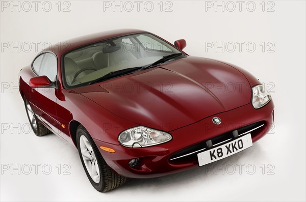 1999 Jaguar XK8 coupe Artist: Unknown.