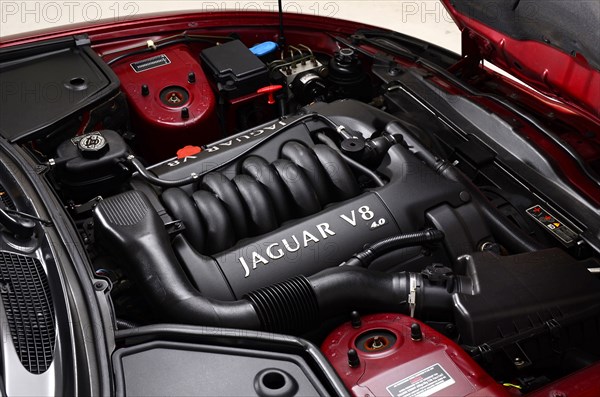 1999 Jaguar XK8 coupe Artist: Unknown.
