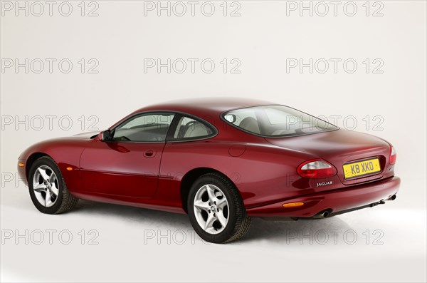 1999 Jaguar XK8 coupe Artist: Unknown.