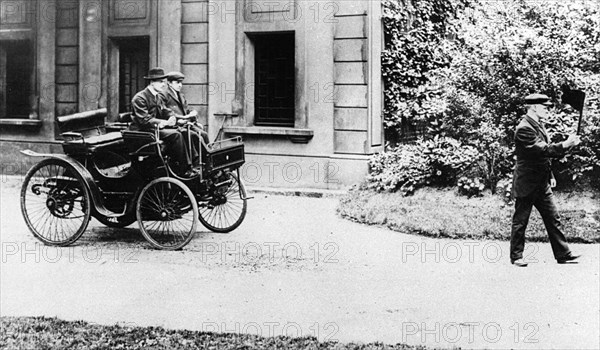 Peugeot 1896 with C.R. Rolls driving and Red flag in front