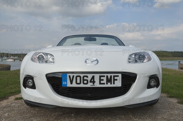 2014 Mazda MX5 Roadster Coupe Artist: Unknown.