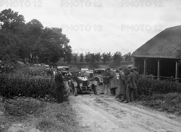 Morris Oxford and 1929 Crossley at the JCC Inter-Centre Rally, 1932. Artist: Bill Brunell.