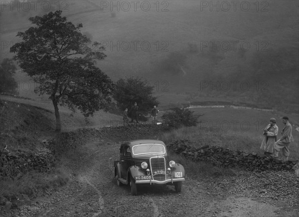 Ford V8 saloon of WS Millar competing in the MCC Sporting Trial, 1935. Artist: Bill Brunell.