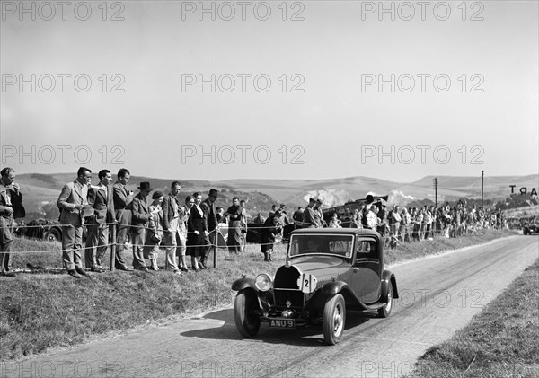 Bugatti Type 49 of CWP Hampton at the Bugatti Owners Club Lewes Speed Trials, Sussex, 1937. Artist: Bill Brunell.