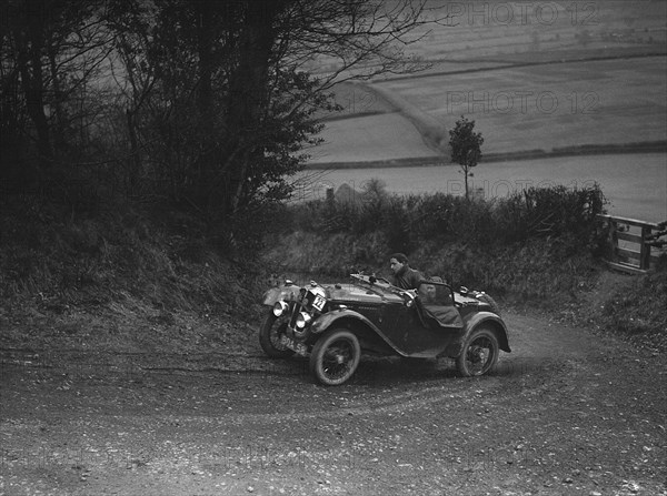 Austin 7 Grasshopper of CD Buckley competing at the MG Car Club Midland Centre Trial, 1938. Artist: Bill Brunell.