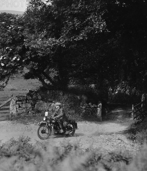 Motorcycle of WT Taylor, Brighton and Hove Motor Club Brighton-Beer Trial, 1930. Artist: Bill Brunell.